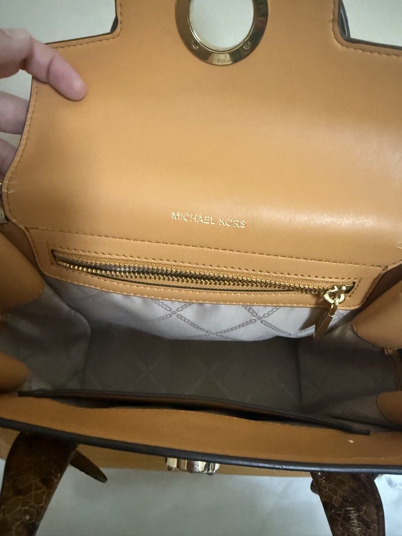 Michael Kors Carmen Belted Satchel (Category: Luxury Bags & Wallets) located in Las Pinas. Submitted by p.noona (Listing ID 1465697849, Image 3). Description: - Brand: Michael Kors structured satchel bag - Design: Mixed textures with textured mustard body, crisp white front flap, and faux snakeskin handles/straps - Hardware: Premium gold-tone hardware featuring the iconic MK circle logo lock - Interior: Multiple compartments with a secure zip poc