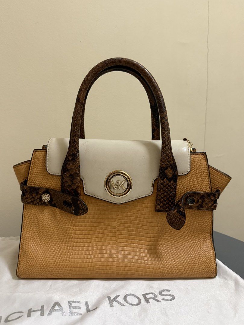 Michael Kors Carmen Belted Satchel (Category: Luxury Bags & Wallets) located in Las Pinas. Submitted by p.noona (Listing ID 1465697849, Image 1). Description: - Brand: Michael Kors structured satchel bag - Design: Mixed textures with textured mustard body, crisp white front flap, and faux snakeskin handles/straps - Hardware: Premium gold-tone hardware featuring the iconic MK circle logo lock - Interior: Multiple compartments with a secure zip poc