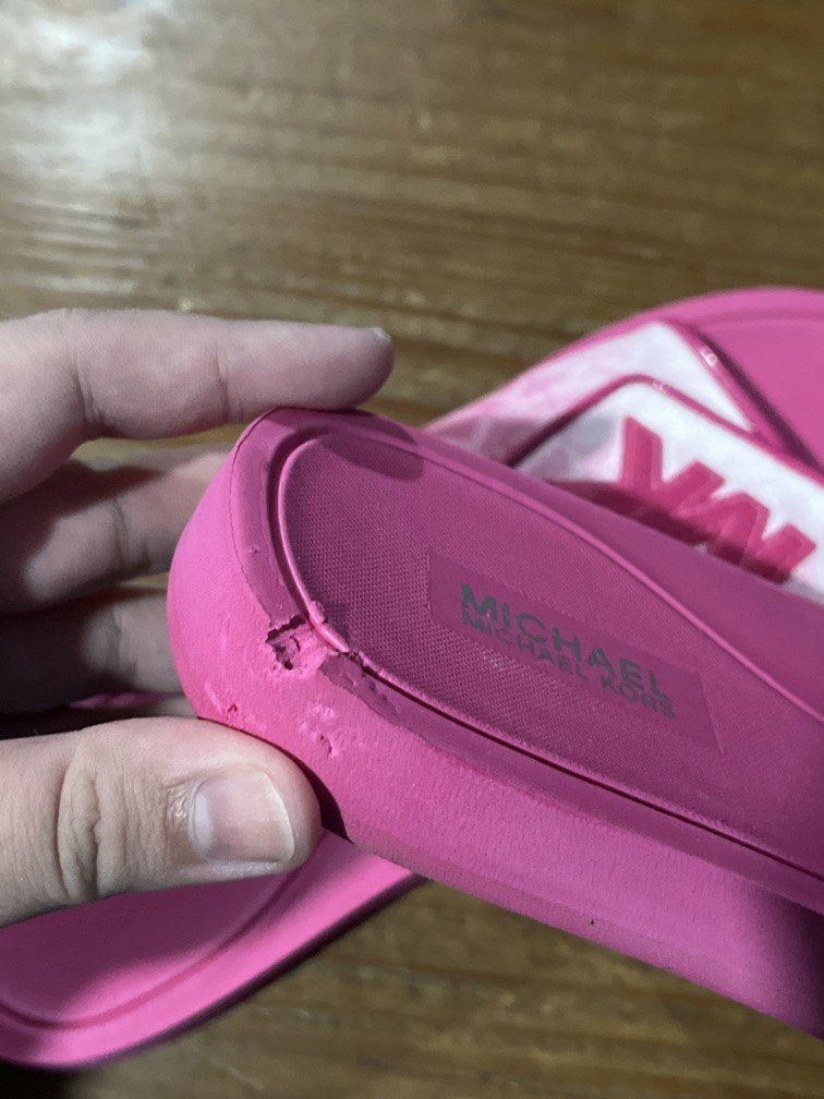 Michael Kors Palmer Slides (WITH ISSUE) (Category: Slippers and slides) located in Quezon City. Submitted by azarels (Listing ID 1465652364, Image 3). Description: Issue shown on the last pic of the photo. This is brand new with flaw. still with gift receipt and paperbag Size: US 8 + local sf This is LAST PRICE na po. Regular price is 2,500 down to 1,200 bc of the flaw. Please don’t offer below asking price. Will not entertain po. 📍Project 8,QC.
