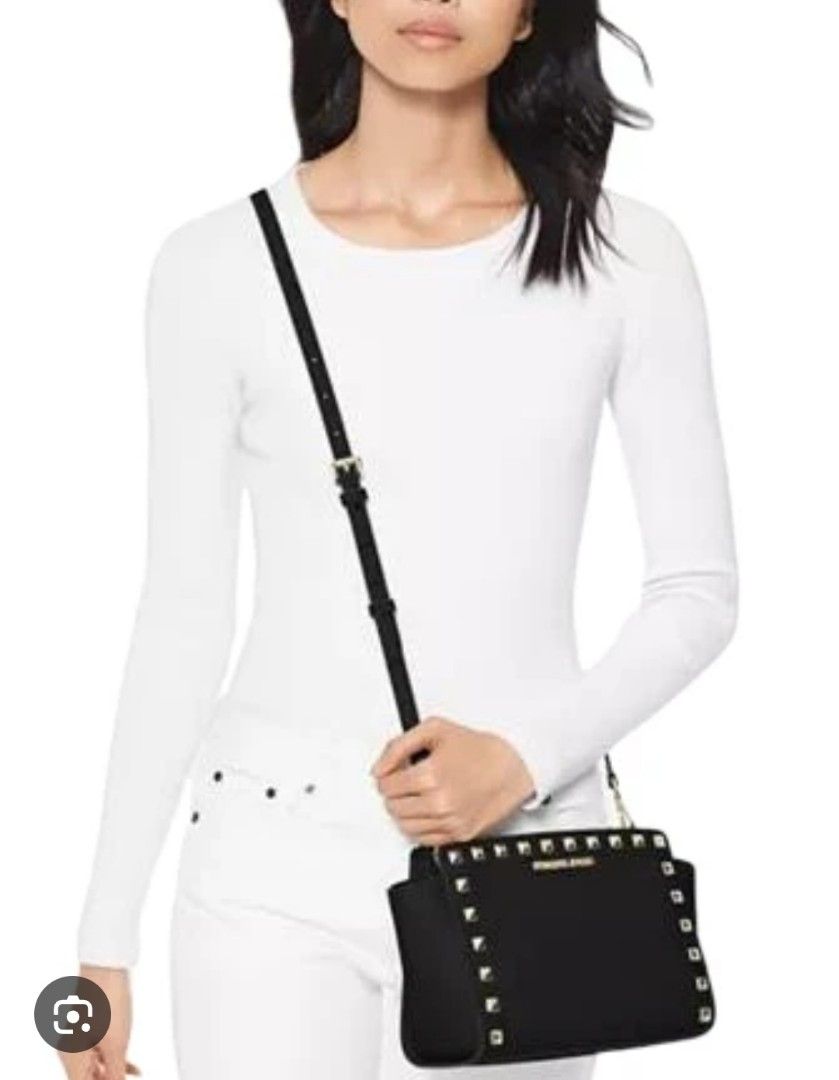 Michael Kors Studded Black Crossbody Bag (Category: Cross-body Bags) located in Baguio. Submitted by ozara.06 (Listing ID 1465699343, Image 2). Description: Michael Kors Small size May isang missing stud sa harap lower left At rubs sa bandnag end ng zipper 700 nlangs.