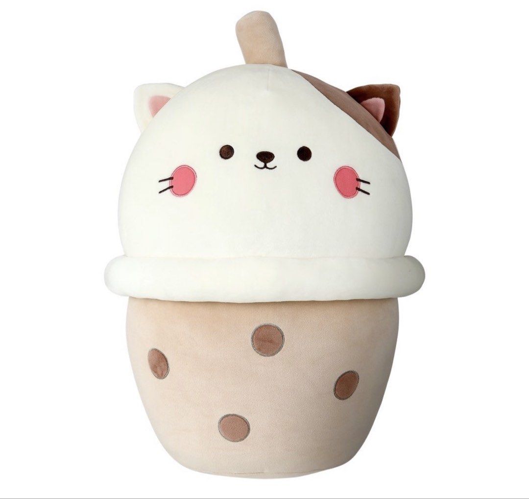 Cat milk tea plush pillow soft stuffed toy (Category: Plushies & Soft Toys) located in Mandaluyong City. Submitted by catpuccinoxo (Listing ID 1465717920, Image 2). Description: Bought from Miniso - Large Milktea Cat plushie (approx. 35-40 tall x 20cm wide) - Made with super soft, fluffy fabric that's great for hugging rfs: no longer sparks joy loc: mandaluyong.