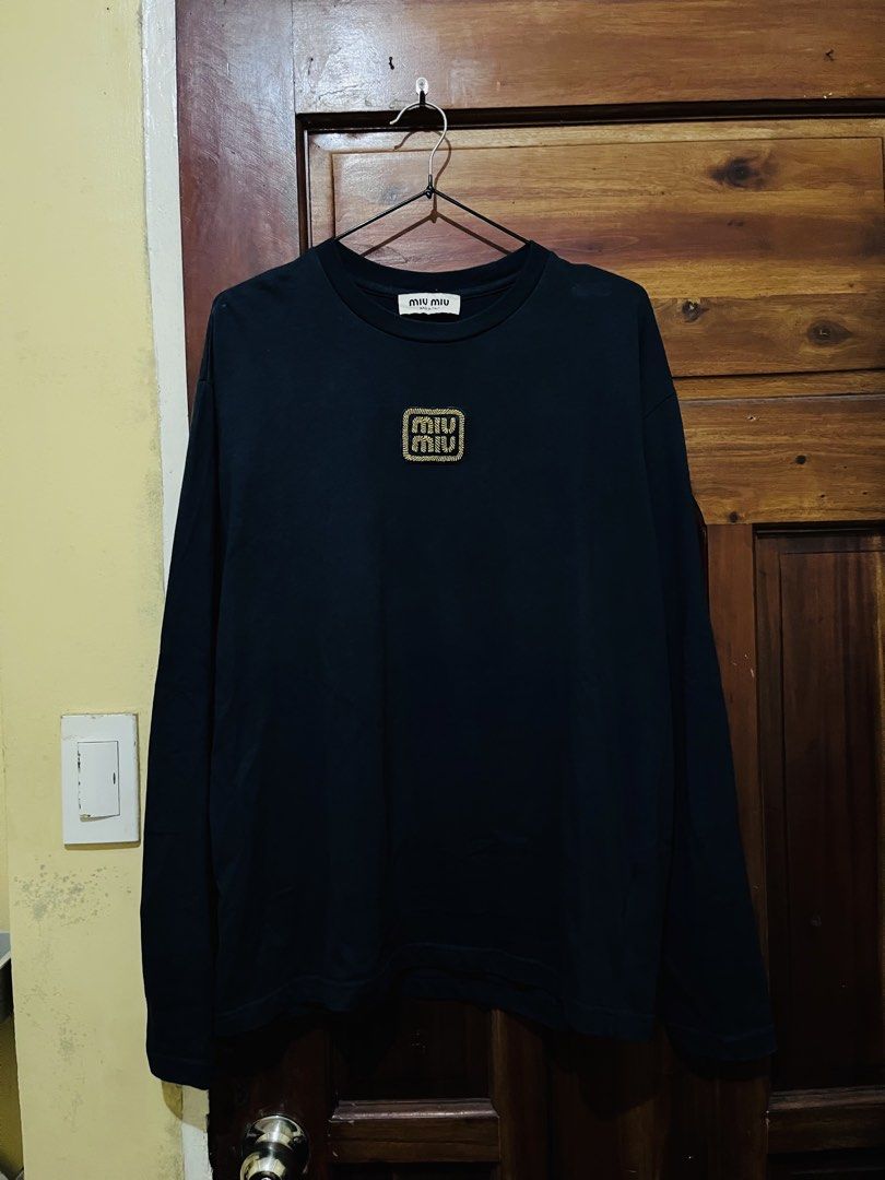 Miu Miu (Category: Longsleeves) located in Tuguegarao City. Submitted by rodel_llanetaa (Listing ID 1465750344, Image 1). Description: Excellent conditon Size M on tag Width 22 Length 26 Color rate 9.8 Flaws 1200+Shippingfee!.
