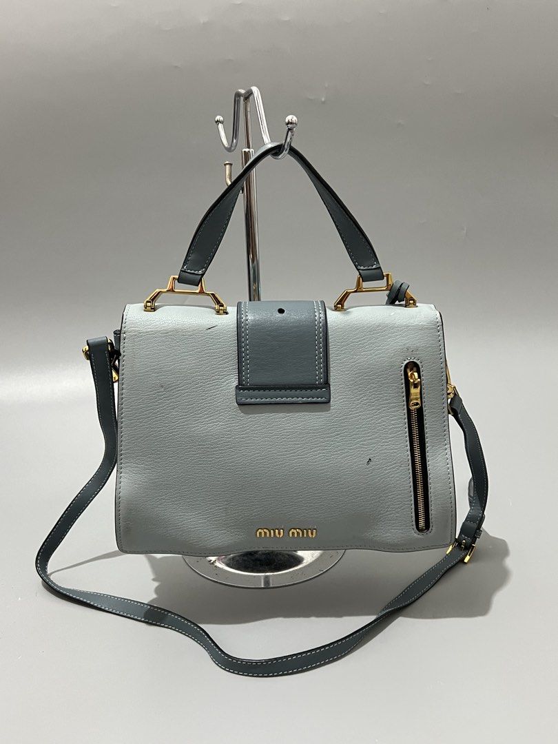 MIU MIU - Madras Crystal - Leather (Category: Cross-body Bags) located in Cavite. Submitted by asianluxe (Listing ID 1465705175, Image 3). Description: Miu Miu - Madras Crystal - Leather Measurements! Length:8 inches Width:10.5 inches Depth:3 inches Lampo Zipper Good condition Very presentable Sign of usage! Check pics.