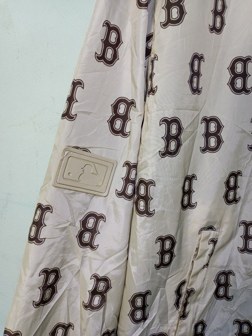 MLB Boston Red Sox monogram all over print windbreaker jacket (Category: Coats, Jackets and Outerwear) located in Manila. Submitted by onewikstraight (Listing ID 1465647384, Image 2). Description: - Brand: MLB Boston Red Sox - Style: Zip-up hooded windbreaker - Size: XL - Color/Design: Cream base with all-over brown 'B' monogram print - Details: Full front zipper, side pockets, adjustable drawstrings, and elastic cuffs - Logo: Blue embroidered Bo
