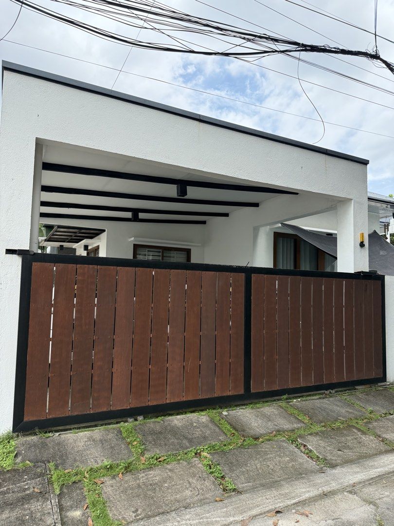 Modern House with Pool and Carport (Category: House & Lot) located in Angeles City. Submitted by juliantinio (Listing ID 1465586579, Image 1). Description: House for rent 🏡 2 bedroom 1 office 1 maids room with cr Both bedrooms with A/C Living room with A/C Powder room Dipping pool which is accessible right outside the glass sliding doors 2 car garage (automated gate) Ideal for starter family Exclusive subdivision in Angeles City Near clark, mark