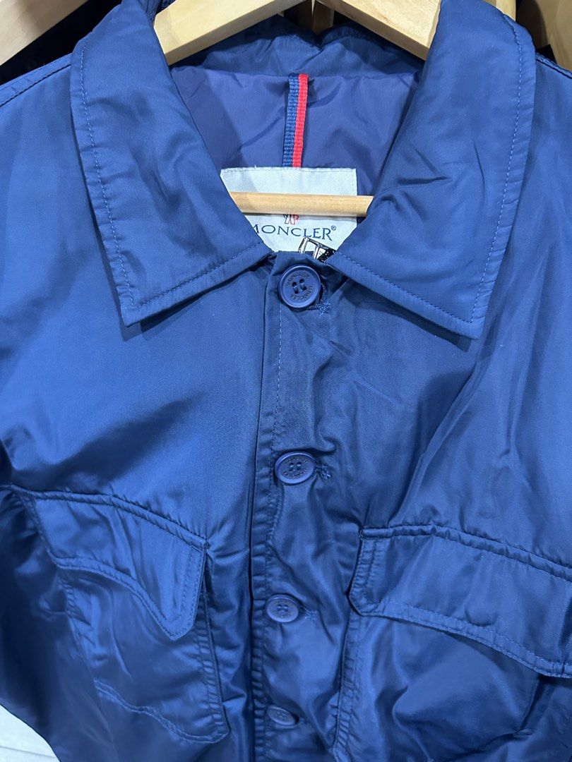 Moncler Blue Nylon Button-Up Jacket (Category: Coats, Jackets and Outerwear) located in Manila. Submitted by bodegabodega (Listing ID 1465696496, Image 3). Description: Moncler Size 6 XL fit Excellent / Like new No issue / flaws 25x28 dimensions 4k .