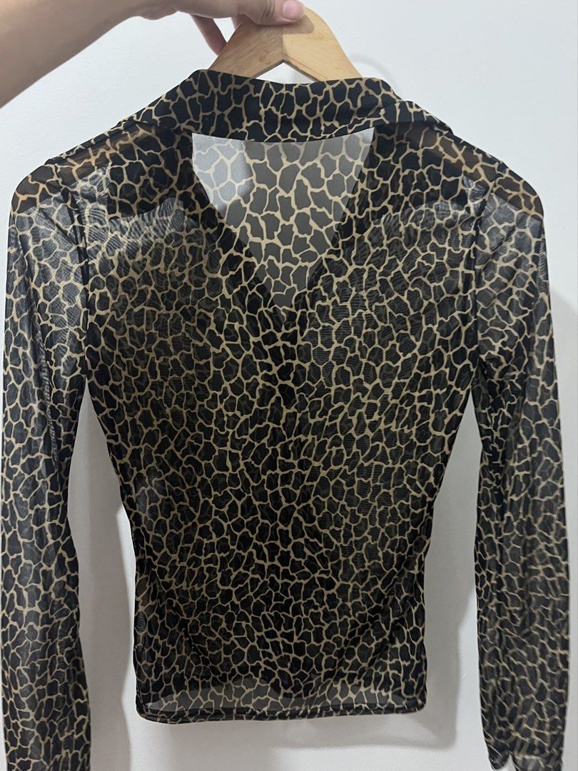 Morgan de Toi sheer giraffe print (Category: Blouses) located in Santa Rosa. Submitted by lanadeldios (Listing ID 1465756086, Image 3). Description: Perfect with low-rise jeans, leather trousers, a mini skirt or paired with vintage animal-print pieces.