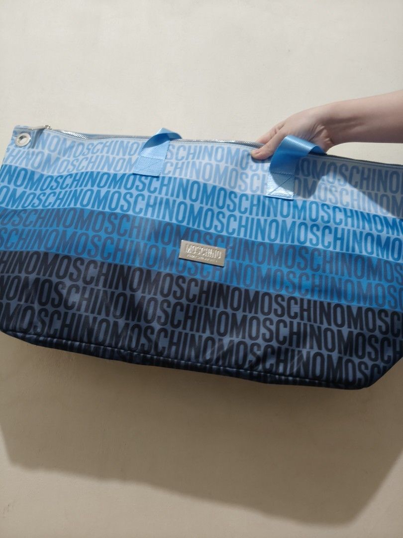 Moschino Beach Bag (Category: Luxury Bags & Wallets) located in Manila. Submitted by heisenbergyo (Listing ID 1465695518, Image 3). Description: Moschino Beach Bag For sale, brand new, with Dust bag. Can give discount for sure buyer.