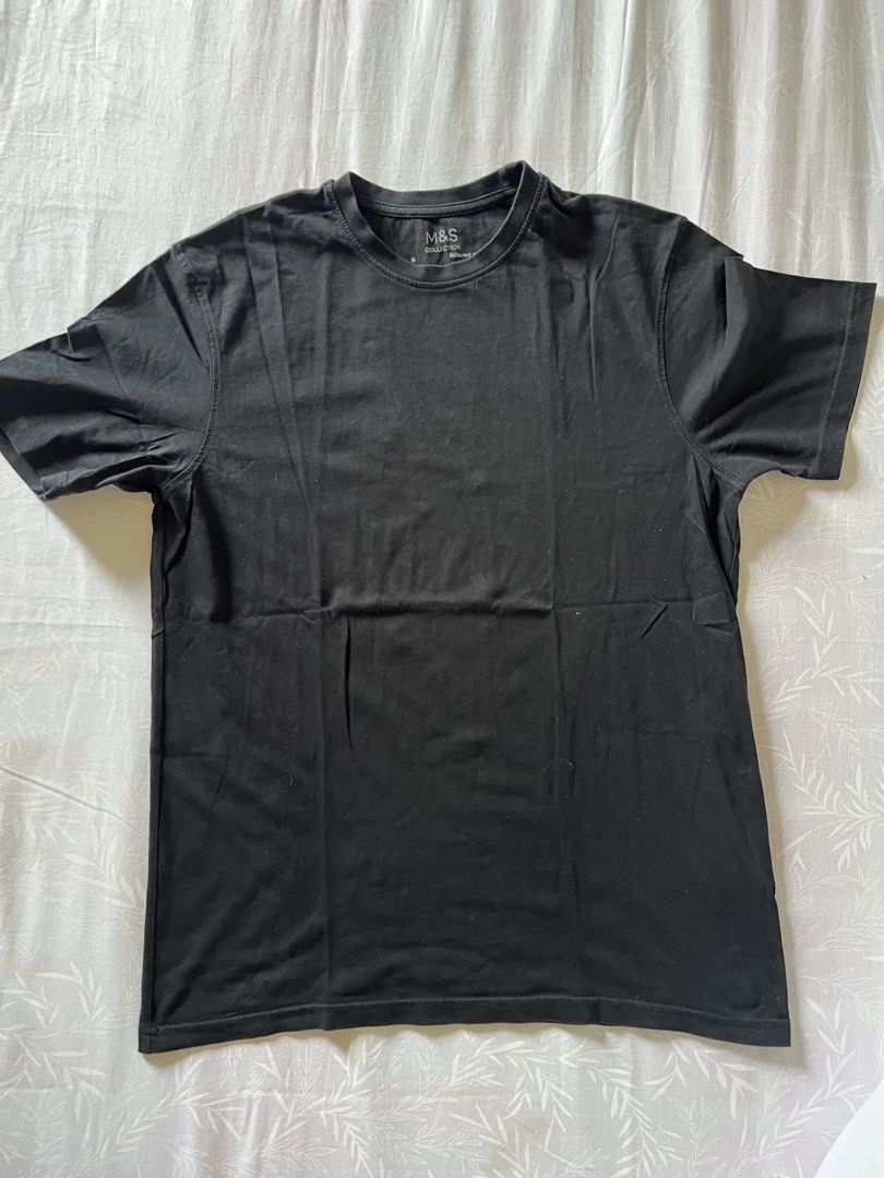 M&S Collection Black T-Shirt (Category: Shirts) located in Quezon City. Submitted by katedeclutter (Listing ID 1465602818, Image 1). Description: - Brand: M&S Collection - Color: Solid black.