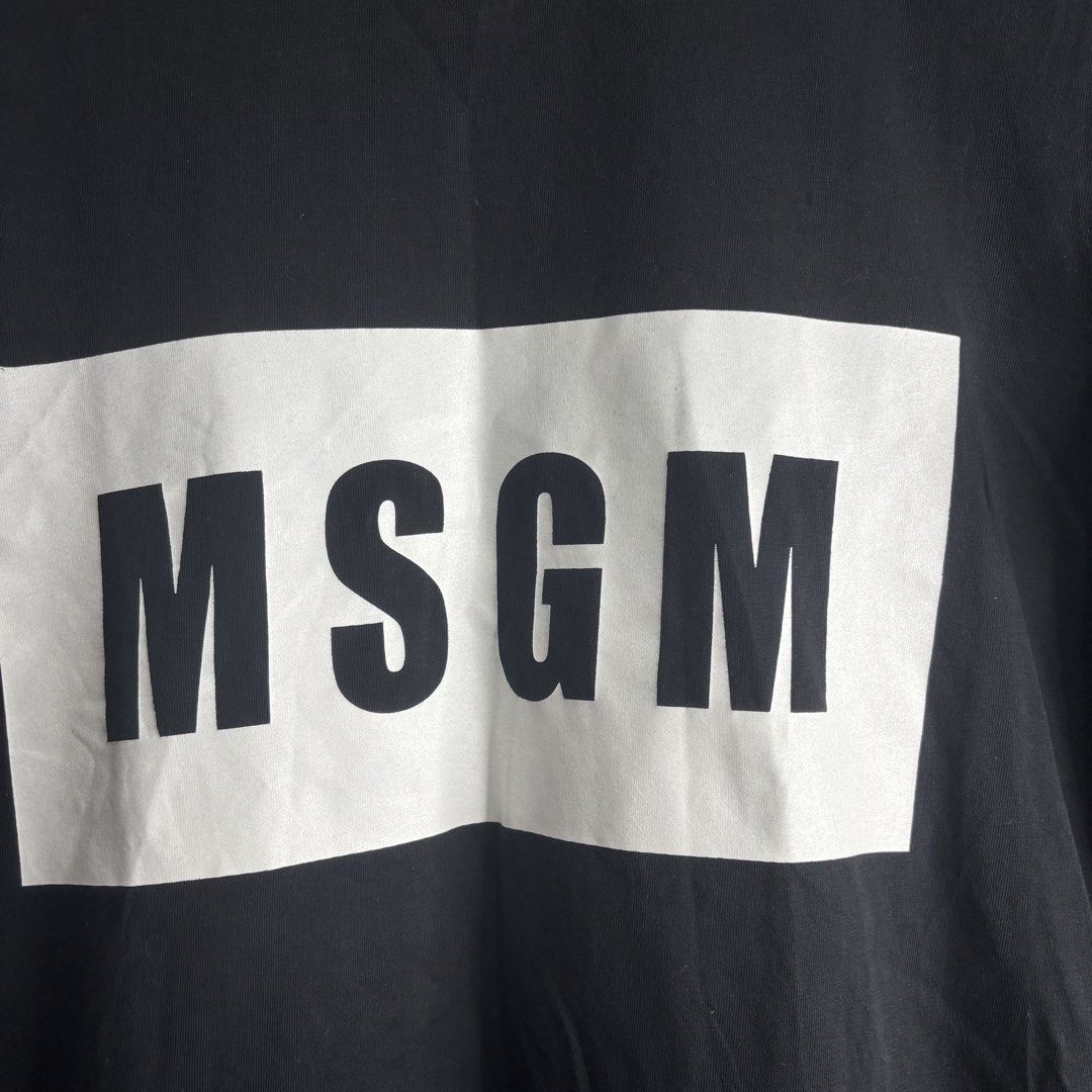 MSGM - Milano Black Logo T-Shirt (Category: Shirts) located in Cavite. Submitted by goodstayojan.cvt (Listing ID 1465718776, Image 2). Description: MSGM - Box Logo Shirt M on tag(18.5 x 25) Verygood Condition No flaws! - Brand: MSGM Milano - Color: Black with bold white box logo - Size: Medium (M) - Material: 100% premium cotton (soft & breathable) - Fit: Regular fit, classic crew neck - Condition: Brand new with tags/labels - Perfect for casual 