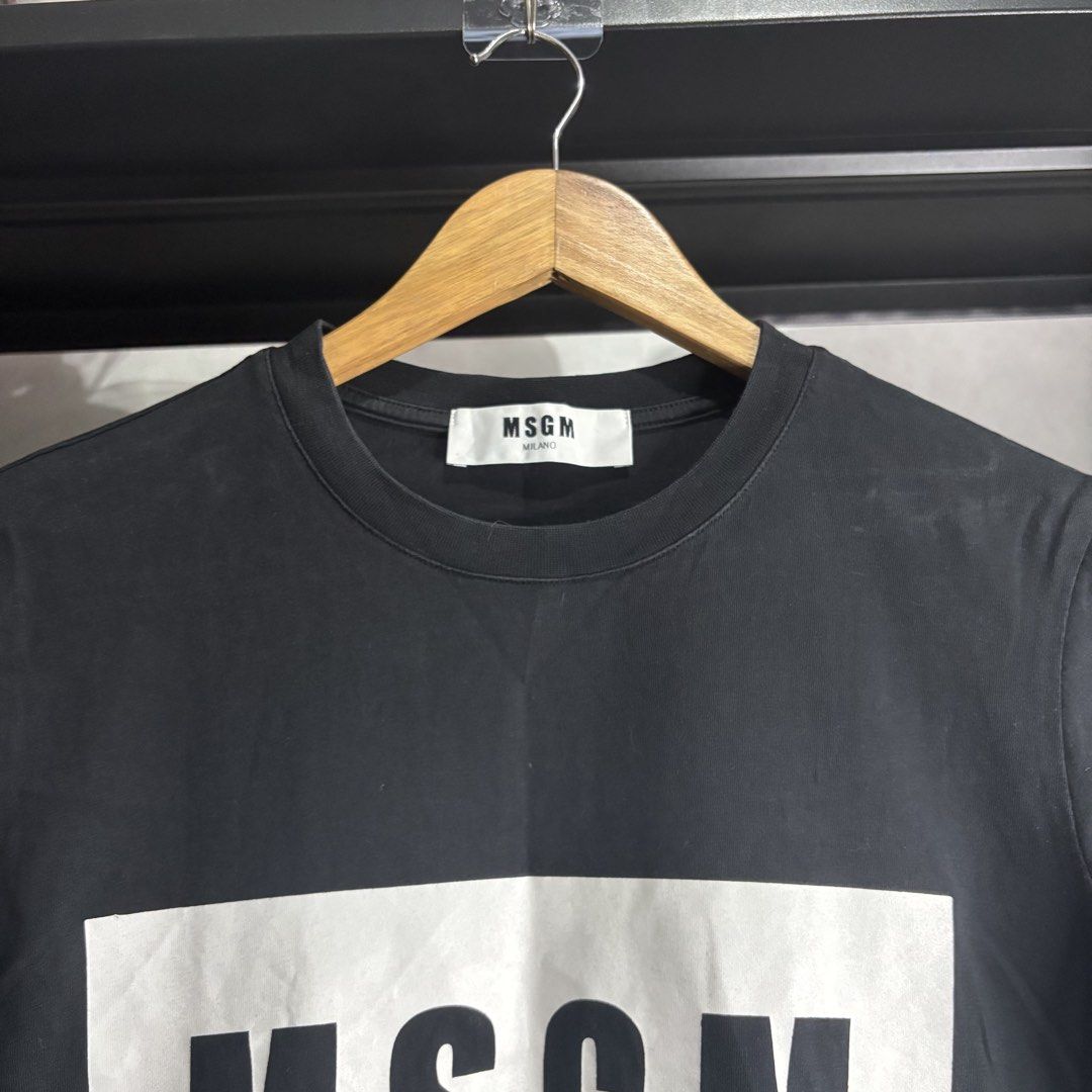 MSGM - Milano Black Logo T-Shirt (Category: Shirts) located in Cavite. Submitted by goodstayojan.cvt (Listing ID 1465718776, Image 3). Description: MSGM - Box Logo Shirt M on tag(18.5 x 25) Verygood Condition No flaws! - Brand: MSGM Milano - Color: Black with bold white box logo - Size: Medium (M) - Material: 100% premium cotton (soft & breathable) - Fit: Regular fit, classic crew neck - Condition: Brand new with tags/labels - Perfect for casual 