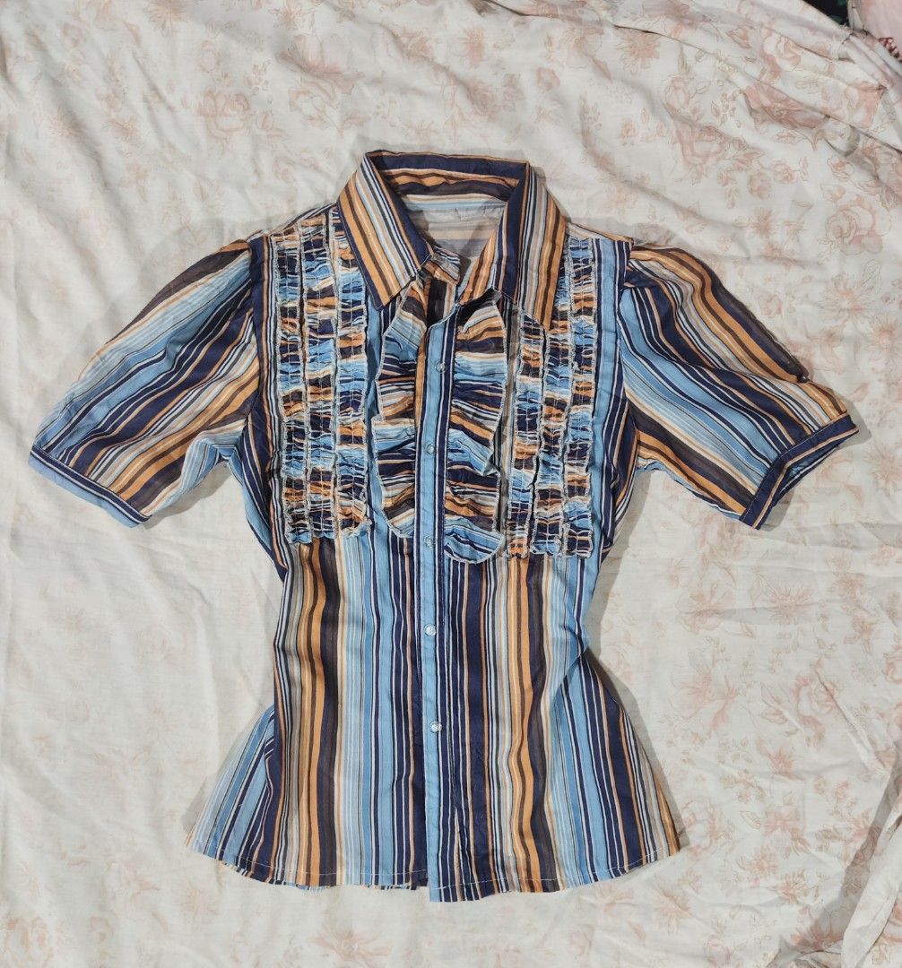 multi-colored striped ruffled trim button down blouse top (Category: Blouses) located in Bulacan. Submitted by angel.decluttersx (Listing ID 1465746020, Image 1). Description: medium size no issue.