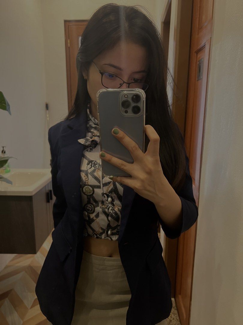 Navy Blue Tailored Blazer Jacket (Category: Coats, Jackets and Outerwear) located in Makati City. Submitted by warm.abc123 (Listing ID 1465587263, Image 2). Description: - Color: Deep navy blue - Fit: Slim cut through the waist, true to size - Details: Structured shoulders, front button closure, functional deep pockets on both sides - Fabric: Smooth, mid-weight - Style: Versatile piece for work or smart casual wear, perfect for layering -you can 