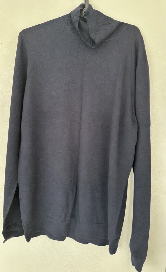 Navy blue turtleneck long sleeve sweater (Category: Coats, Jackets and Outerwear) located in Quezon City. Submitted by aussomefinds (Listing ID 1465620521, Image 1). Description: - Color: Navy Blue - Style: Turtleneck sweater with long sleeves - Material: Soft, warm knit - Details: Ribbed cuffs and hem - Fit: Comfortable and easy to layer with jackets or coats - Season: Perfect for autumn and winter.