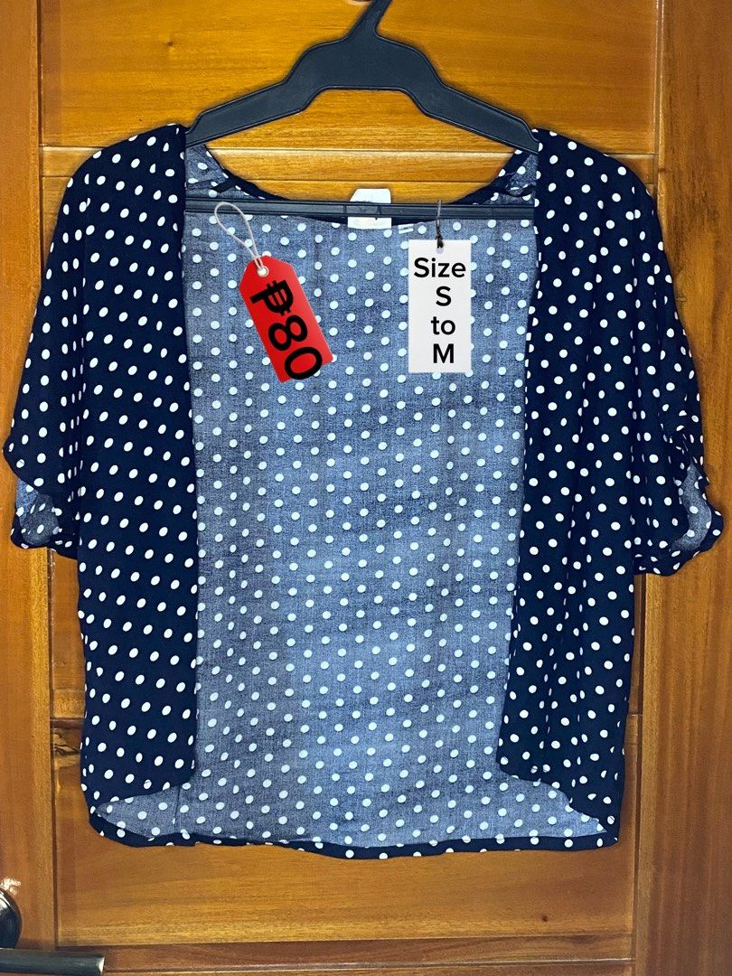 Navy Blue White Polka Dot Open Front Cardigan (Category: Coats, Jackets and Outerwear) located in Baguio. Submitted by heath2600 (Listing ID 1465730669, Image 1). Description: - Color & Pattern: Navy blue with white polka dots - Style: Open front, short sleeve cardigan - Fit: Comfortably fits Small to Medium - Material: Lightweight fabric, ideal for layering - Condition: Great for casual everyday wear.