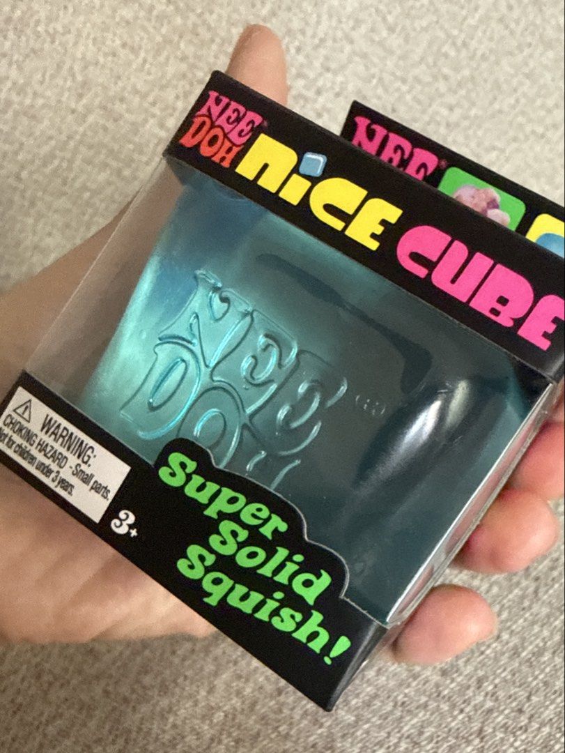 NeeDoh Nice Cube Super Solid Squish Fidget Toy (Category: Kids Toys) located in Quezon City. Submitted by rosiehankie (Listing ID 1465598437, Image 1). Description: Original NeeDoh Nice Cube Fidget Toy Translucent blue Condition: Brand new inside original.