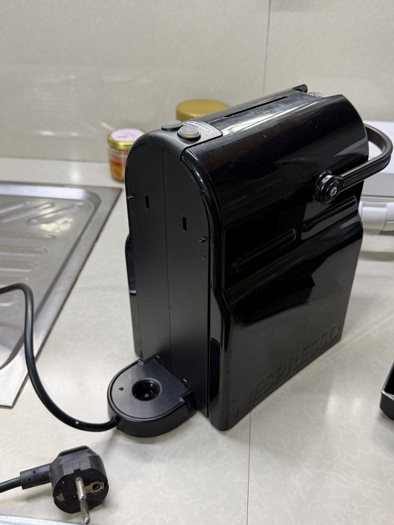 NESPRESSO (Category: Coffee Machines & Makers) located in Caloocan City. Submitted by yghnlll (Listing ID 1465691646, Image 3). Description: FOR SALE ONLY NESPRESSO MACHINE ISSUE: NO WATER TANK NABASAG NG PUSA FREEBIES: 10 CAPSULE INCLUSION: BOX MANUAL.