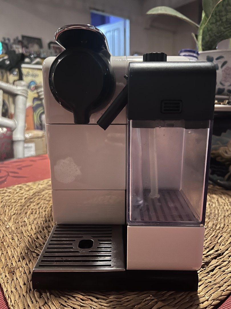 Nespresso DeLonghi Lattissima Touch Coffee Maker White (Category: Coffee Machines & Makers) located in Dasmarinas. Submitted by keilhai02 (Listing ID 1465741442, Image 1). Description: - Model: Nespresso DeLonghi Coffee Maker in sleek white - Milk Frother: Integrated unit for easy lattes and cappuccinos - One-Touch Panel: 6 buttons for espresso, cappuccino, latte, and more - Design: Chrome lever capsule chamber and rear ventilation - Easy Mainten
