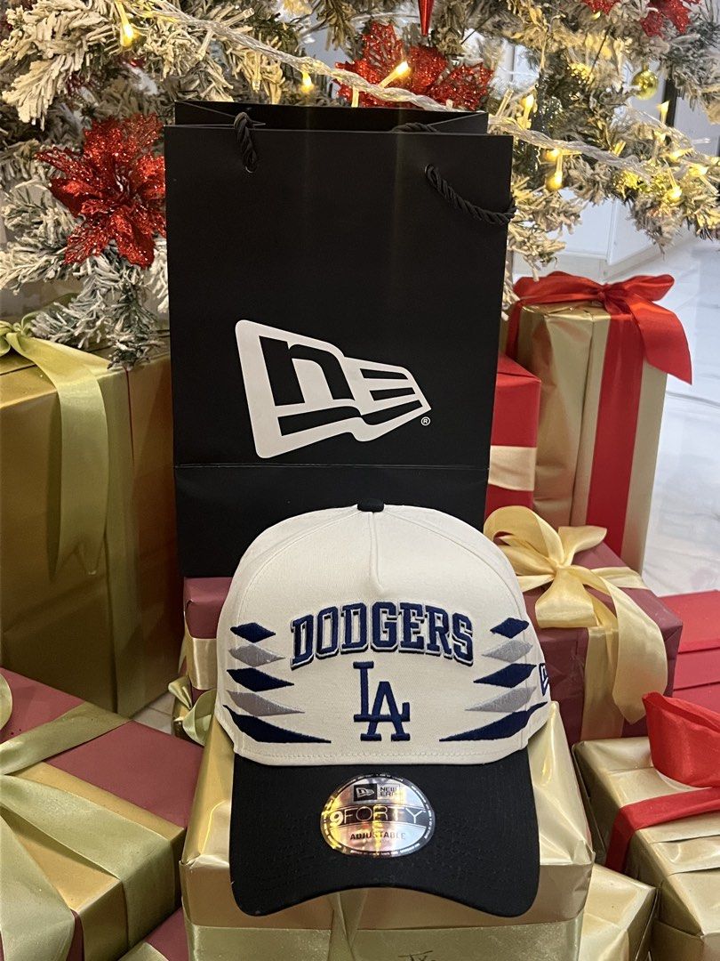New Era 9FORTY LA Dodgers Diamond Cut Cap (Category: Caps & Hats) located in Gapan. Submitted by arieltinio (Listing ID 1465754872, Image 1). Description: - Brand: New Era - Style: 9FORTY A-Frame Snapback - Team: Los Angeles Dodgers - Color: White crown with navy blue brim - Design: Geometric diamond cut side patterns with embroidered LA logo - Condition: Brand new, unworn with retail price tag and official MLB hologram - Inclusions: Original New