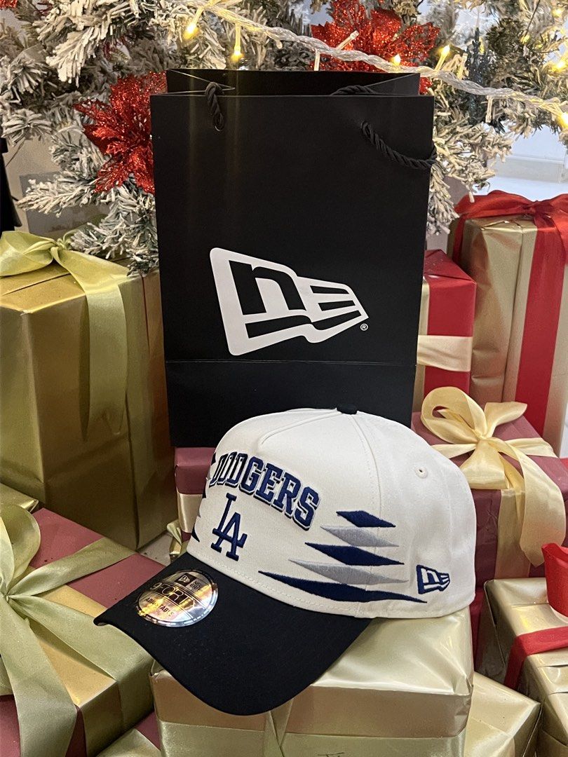 New Era 9FORTY LA Dodgers Diamond Cut Cap (Category: Caps & Hats) located in Gapan. Submitted by arieltinio (Listing ID 1465754872, Image 2). Description: - Brand: New Era - Style: 9FORTY A-Frame Snapback - Team: Los Angeles Dodgers - Color: White crown with navy blue brim - Design: Geometric diamond cut side patterns with embroidered LA logo - Condition: Brand new, unworn with retail price tag and official MLB hologram - Inclusions: Original New