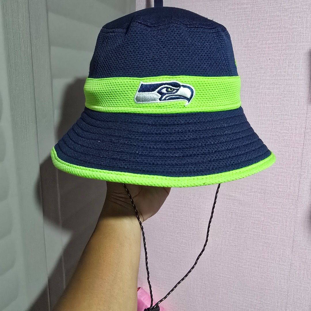 New Era Seahawks Bucket Hat (Category: Caps & Hats) located in Quezon City. Submitted by SuotKalyeManila (Listing ID 1465600303, Image 2). Description: Manage your expectations ukay ukay caps po ito at hindi po brand new pero minsan mga flaws pero wearable naman ang presyo po ay depende sa kondisyon ng cap Condition: Excellent Size: One Size Fits All Color Rate: 9.5/10 No Issue Laba na po and ready to wear pm for details .