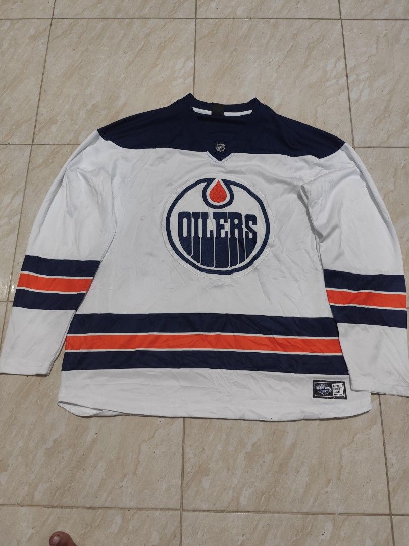 NHLEdmonton Oilers Jersey Large (Category: Activewear) located in Manila. Submitted by buyybustt (Listing ID 1465700355, Image 1). Description: NHL Edmonton Oilers NHL Tag 23x30 Large on Tag In Good Condition but have washable stain.