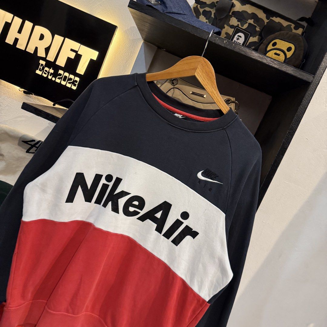 Nike Air Colorblock Sweatshirt (Category: Coats, Jackets and Outerwear) located in Manila. Submitted by carbungcoalex (Listing ID 1465742573, Image 2). Description: NIKE AIR TRITONE SWEATSHIRT 23 by 27 Good Condition Complete tags 800 CLAIM.