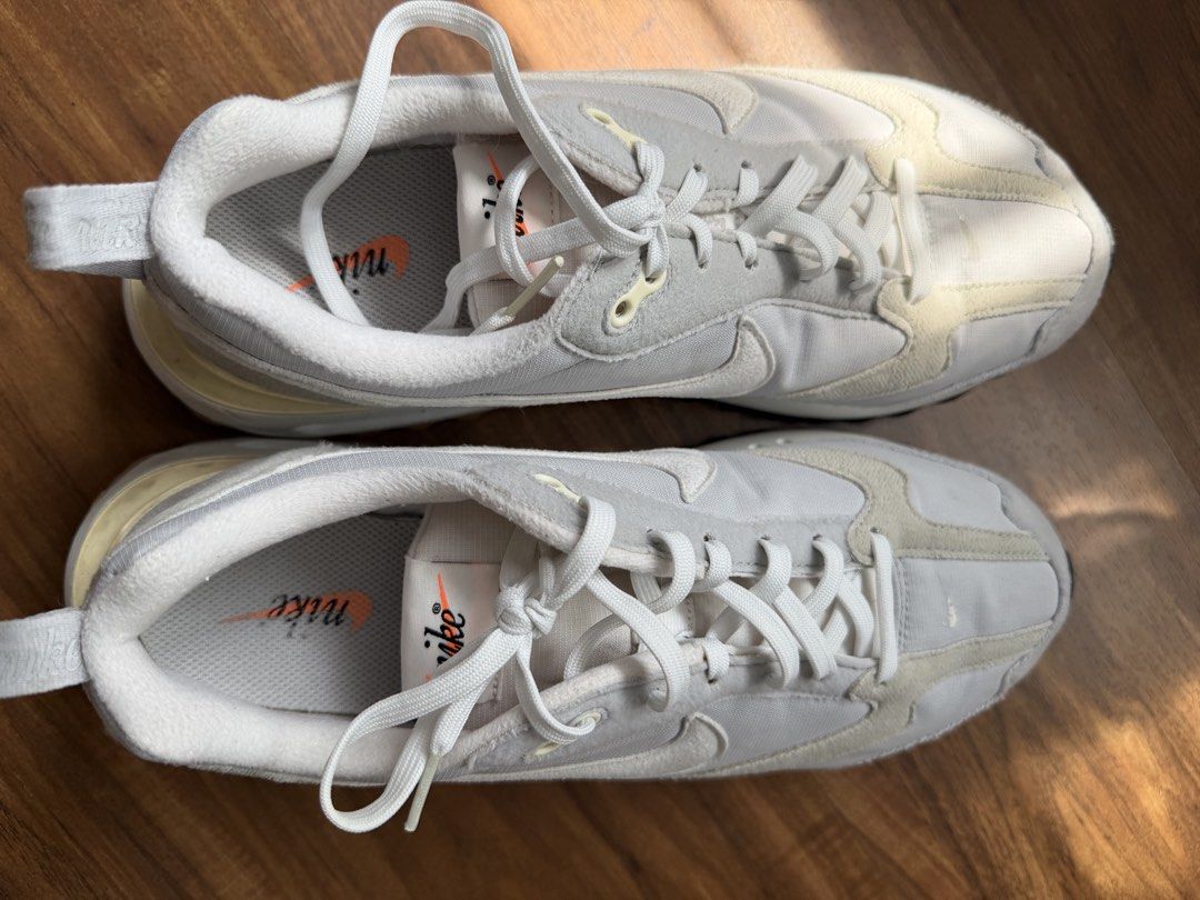Nike Air Max Pre-Day White Grey Sneakers (Category: Casual Shoes) located in Paranaque City. Submitted by xavierllamas (Listing ID 1465622819, Image 1). Description: - Brand/Model: Nike Air Max - Colorway: White and grey with orange accents - Size: US 9.5 / UK 8.5 / EUR 43 - Features: Classic running silhouette, lightweight cushioning, distinctive textured outsole - Condition: Clean upper material, soles show minor signs of wear - Best for: Casua