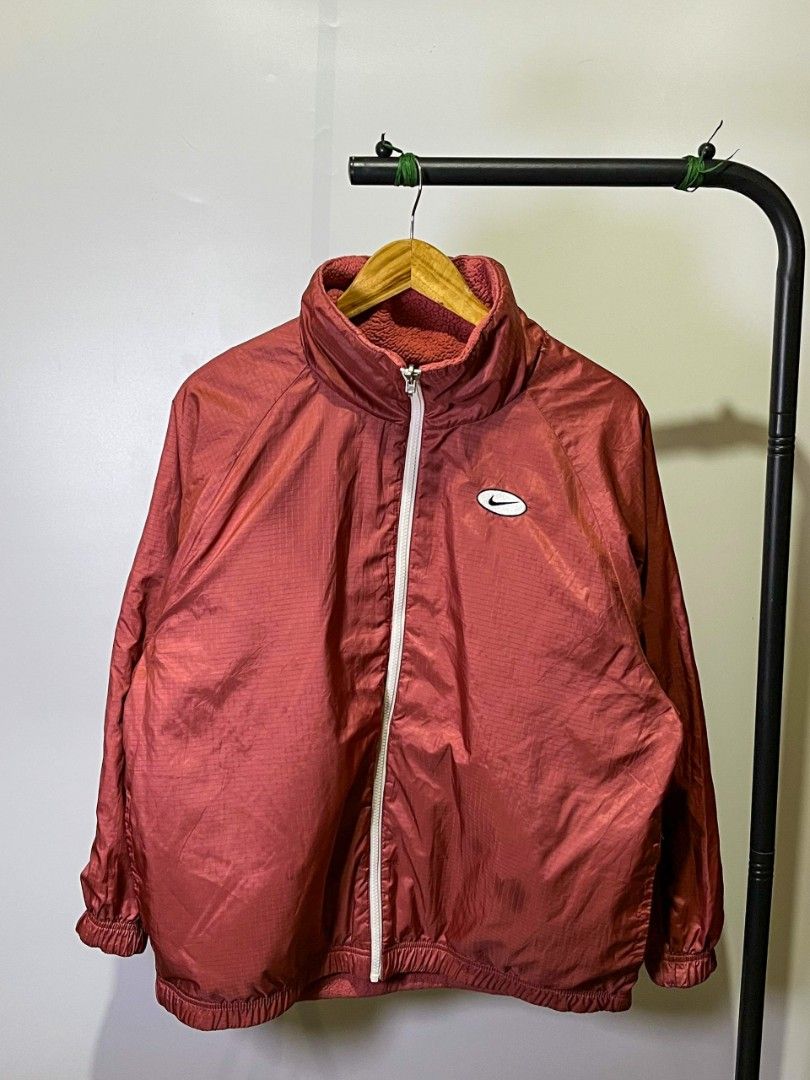 NIKE BIG SWOOSH SHERPA REVERSIBLE JACKET (Category: Coats, Jackets and Outerwear) located in Davao. Submitted by nmd.archives (Listing ID 1465632721, Image 2). Description: Medium on tag 25 x 27 (fits XL) Color rate and condition: 10/10 No issue.
