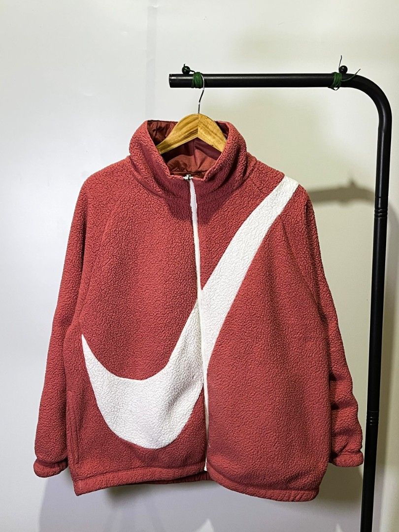 NIKE BIG SWOOSH SHERPA REVERSIBLE JACKET (Category: Coats, Jackets and Outerwear) located in Davao. Submitted by nmd.archives (Listing ID 1465632721, Image 1). Description: Medium on tag 25 x 27 (fits XL) Color rate and condition: 10/10 No issue.