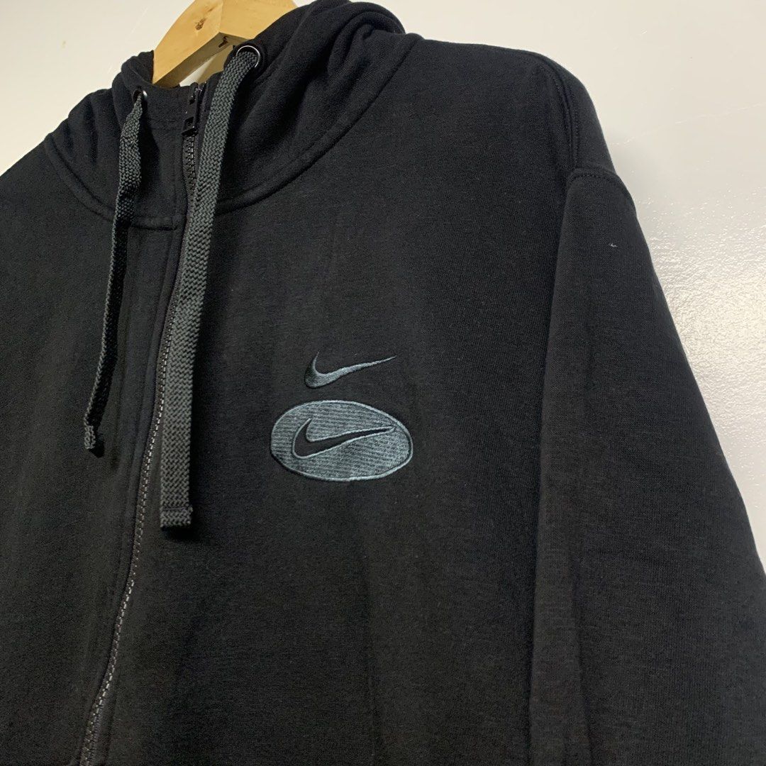Nike Black Zip-Up Hoodie (Category: Hoodies) located in Manila. Submitted by grapplers.gallery (Listing ID 1465742426, Image 2). Description: - Brand: Nike - Style: Full zip hoodie with drawstring hood - Color: Classic Black - Size: 2XL - Details: Embroidered double swoosh logo on chest, front pockets, ribbed cuffs and hem - Origin: Made in China - Condition: Excellent everyday wear layer.
