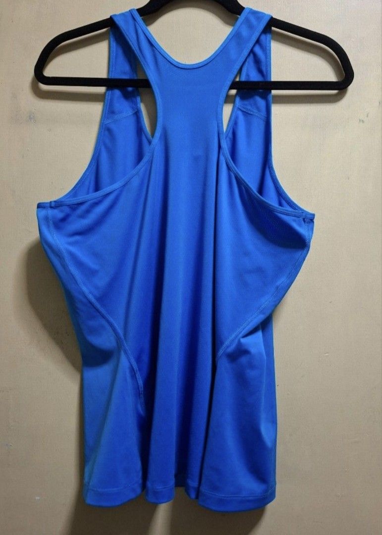 Nike Blue Drifit Racerback (Category: Sleeveless) located in Manila. Submitted by thrifter_lifestyle (Listing ID 1465690639, Image 3). Description: Brand: Nike Fully stretchable and sweat absorbent Racerback Color: Blue 💙 Perfect for running 🏃‍♀️ Barely worn! rfs: closet spring cleaning.
