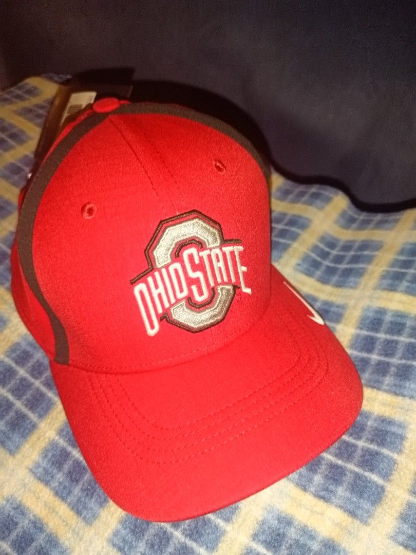 Nike Classic 99 Swoosh Cap (Style Code: 845789-657) (Category: Caps & Hats) located in Baguio. Submitted by valenzuela.jc (Listing ID 1465697772, Image 1). Description: Sourced from Canada - Brand: Nike Aerobill - Team: Ohio State Buckeyes - Color: Bright red with embroidered official logo - Condition: Brand new with original retail tags attached - Comfort: Lightweight, breathable fabric to keep you cool - Fit: Adjustable back strap, one size fit