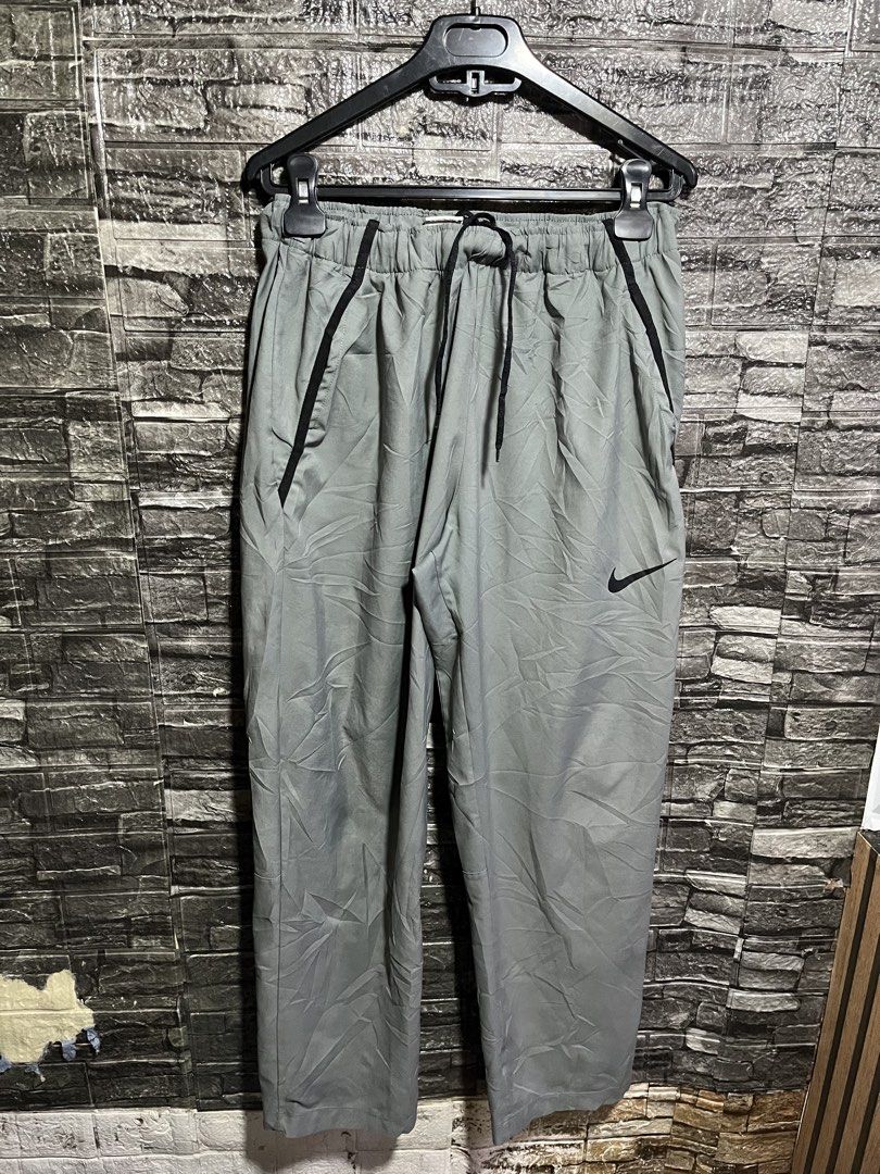 Nike Dri Fit Woven Pants (Category: Activewear) located in Manila. Submitted by flex_curation (Listing ID 1465579369, Image 1). Description: 32-36W 39L 8HEM IN VERY GOOD CONDITION BACOOR CAVITE LOC.