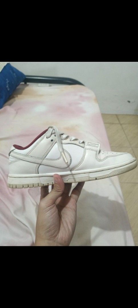 Nike Dunk Low SE 'Just Do It' White Phantom (Category: Sneakers) located in Manila. Submitted by ag.101722 (Listing ID 1465651770, Image 1). Description: Authentic preloved shoes Nike dunk low SE "Just do it" Colorway: White phantom / Red Size: US 6wmns / 36.5 EU / 23cm Lightly used not abused, no major issues, tears and creases (see photos) No OG box but will provide alternative as seen in pics.