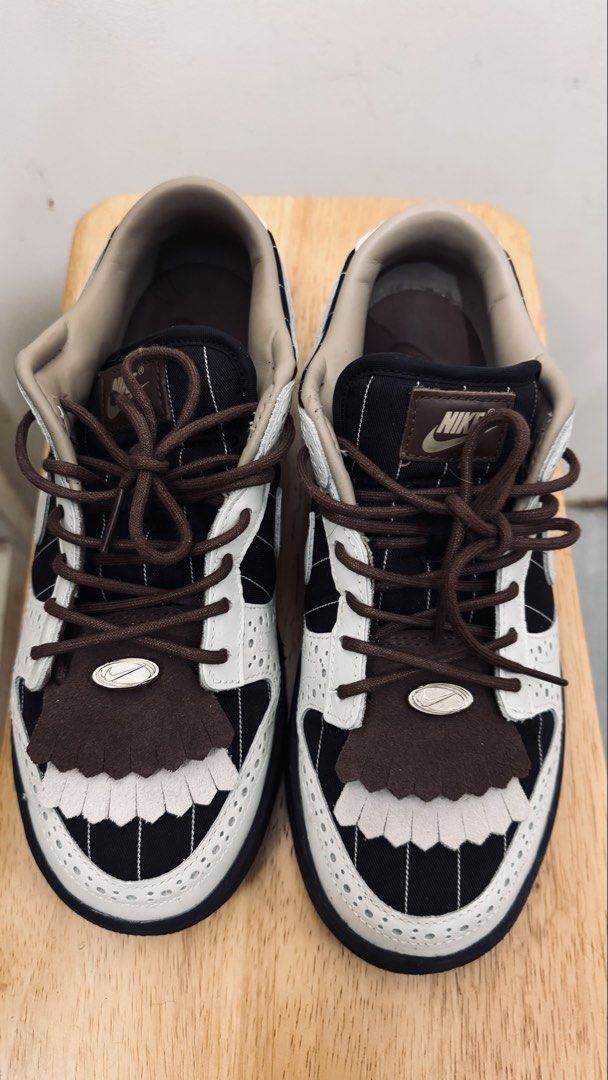 Nike Golf Brogue Custom Sneakers Black White Brown (Category: Sneakers) located in Muntinlupa City. Submitted by joanmarcos (Listing ID 1465678972, Image 1). Description: - Custom Nike golf sneakers in a striking hybrid brogue style - Black base with crisp white overlays and classic pinstripe detailing - Stylish brown laces and matching inner lining - Layered leather fringe kiltie on the toe box accented with silver Nike logo hardware - Eye-catch