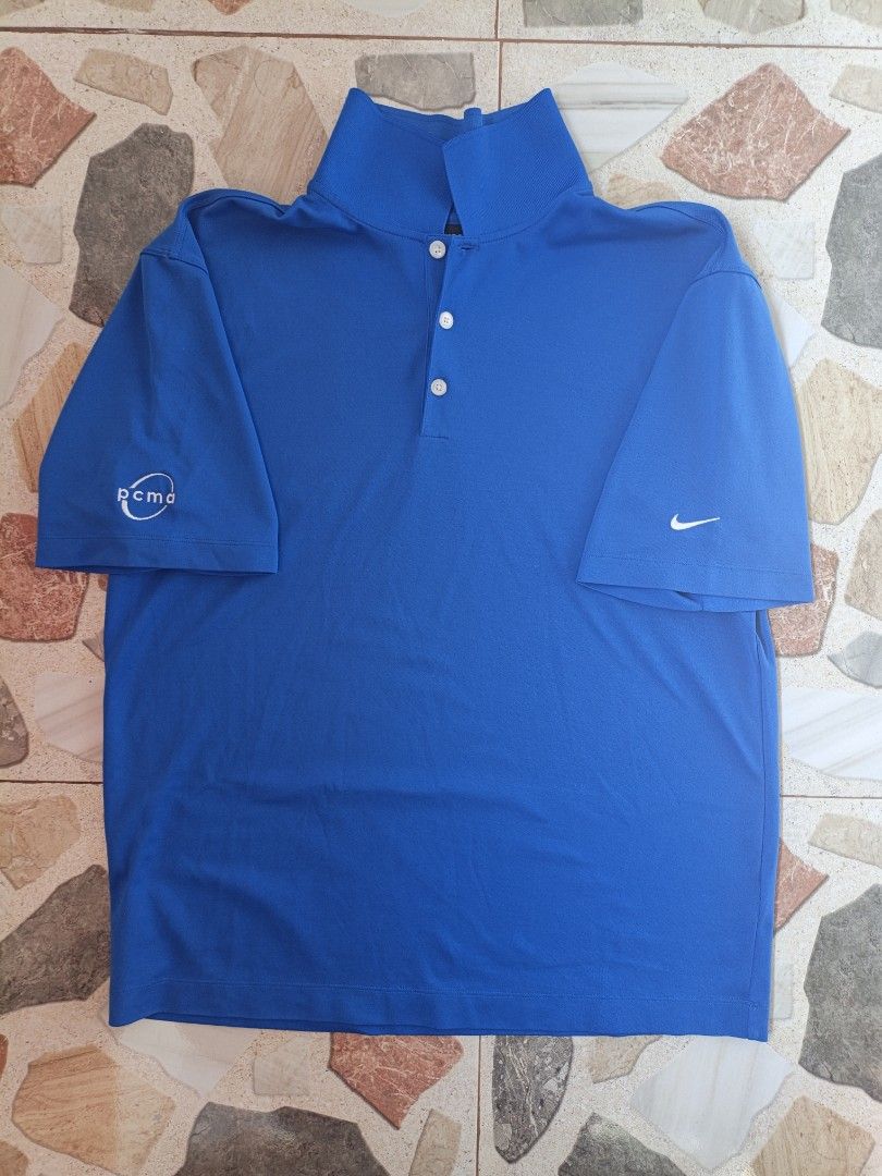 Nike Golf Polo | Royal Blue (PCMA) (Category: Activewear) located in Manila. Submitted by thriftters27 (Listing ID 1465587862, Image 1). Description: Nike Golf Polo | Royal Blue (PCMA) Nike golf polo na royal blue, may embroidered PCMA logo sa sleeve at small white swoosh. Dri-fit style na tela, pang-golf o pang-casual. 📏 W: 22 | L: 29.5 📍 Dasmariñas, Cavite 🚚 Courier: J&T 💳 Payment: GCash 📩 PM for orders.