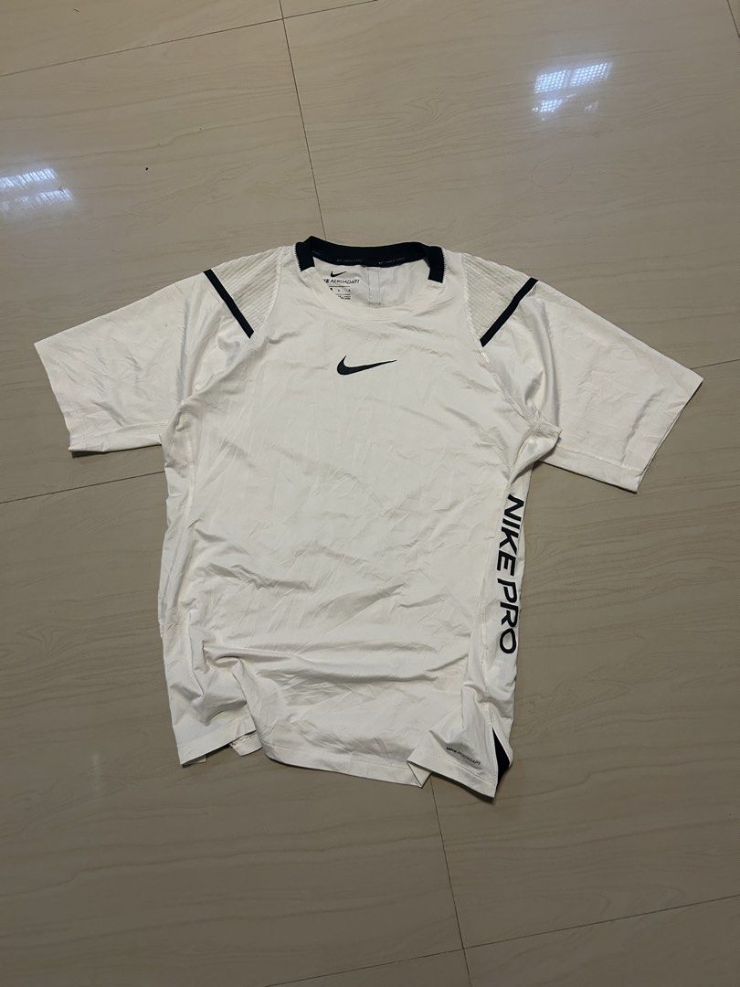 Nike Pro AeroAdapt White Training T-Shirt Size L (Category: Activewear) located in Dasmarinas. Submitted by zn_upcldtrs (Listing ID 1465637685, Image 1). Description: - 21 W / 28 L - As New Condition - No Issue.