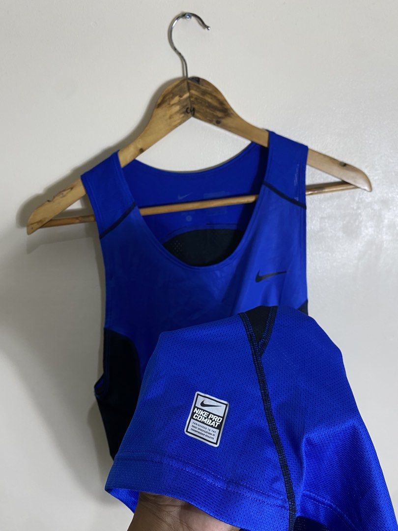 Nike Pro Combat Dri-FIT Blue Tank Top (Category: Activewear) located in Cebu City. Submitted by theloose.thread (Listing ID 1465754135, Image 3). Description: - Authentic Nike Pro Combat tank top - Size: Large - Color: Royal Blue with Black mesh panels - Dri-FIT tech wicks away sweat to keep you cool - Breathable fabric on back and sides for ventilation - Perfect for gym sessions, running, and heavy training - Condition: Great / Well-maintained.