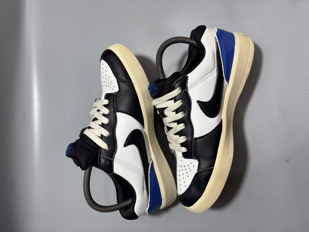 Nike SB Force 58 Travis Scott Black White Blue (Category: Sneakers) located in Butuan. Submitted by shoeetasho (Listing ID 1465740497, Image 3). Description: - Brand: Nike SB - Colorway: Black, white, and blue with cream soles - Size: 7.5 US / 40 EUR / 25.5 cm - Details: Textured laces and blue heel panels with printed graphics - Condition: Great addition to your rotation - Perks: FREE shipping included in the price!.