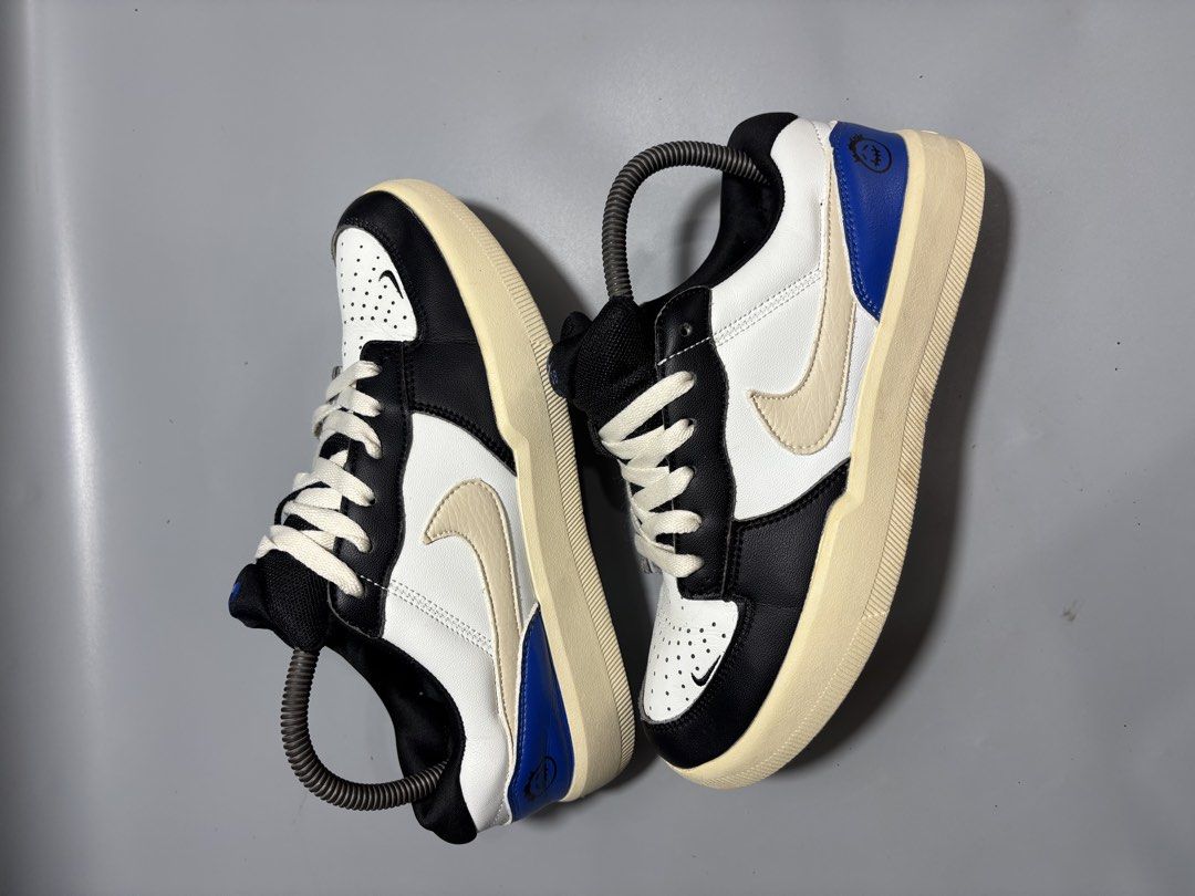 Nike SB Force 58 Travis Scott Black White Blue (Category: Sneakers) located in Butuan. Submitted by shoeetasho (Listing ID 1465740497, Image 2). Description: - Brand: Nike SB - Colorway: Black, white, and blue with cream soles - Size: 7.5 US / 40 EUR / 25.5 cm - Details: Textured laces and blue heel panels with printed graphics - Condition: Great addition to your rotation - Perks: FREE shipping included in the price!.