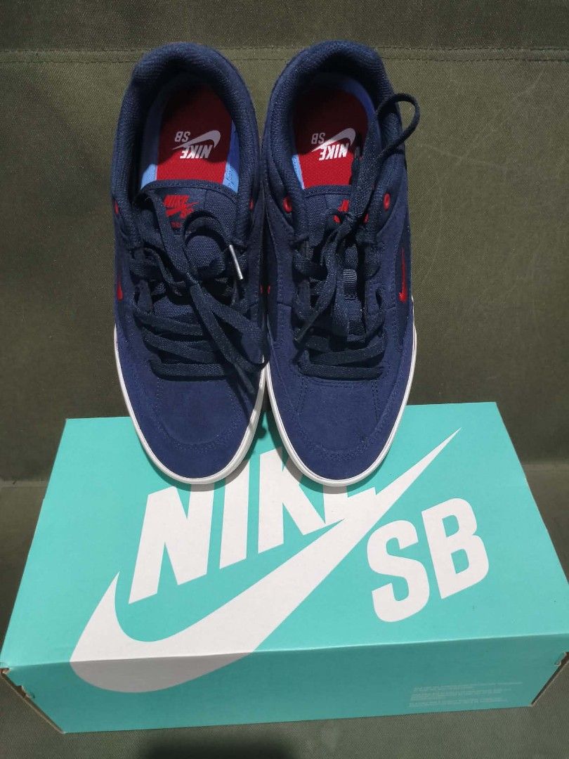 Nike SB Malor Navy Red Size 7 Mens (Category: Sneakers) located in Quezon City. Submitted by Patatas (Listing ID 1465586326, Image 2). Description: - Item: Nike SB Malor - Colorway: Obsidian, Midnight Navy, and Gym Red - Size: Men's US 7 / 25cm / EUR 40 - Condition: Brand new, never worn, comes with original box - History: Bought last May at SMNE Sports Complex - Reason for selling: Need funds - Meetups: Novaliches or Fairview area - Delivery: La