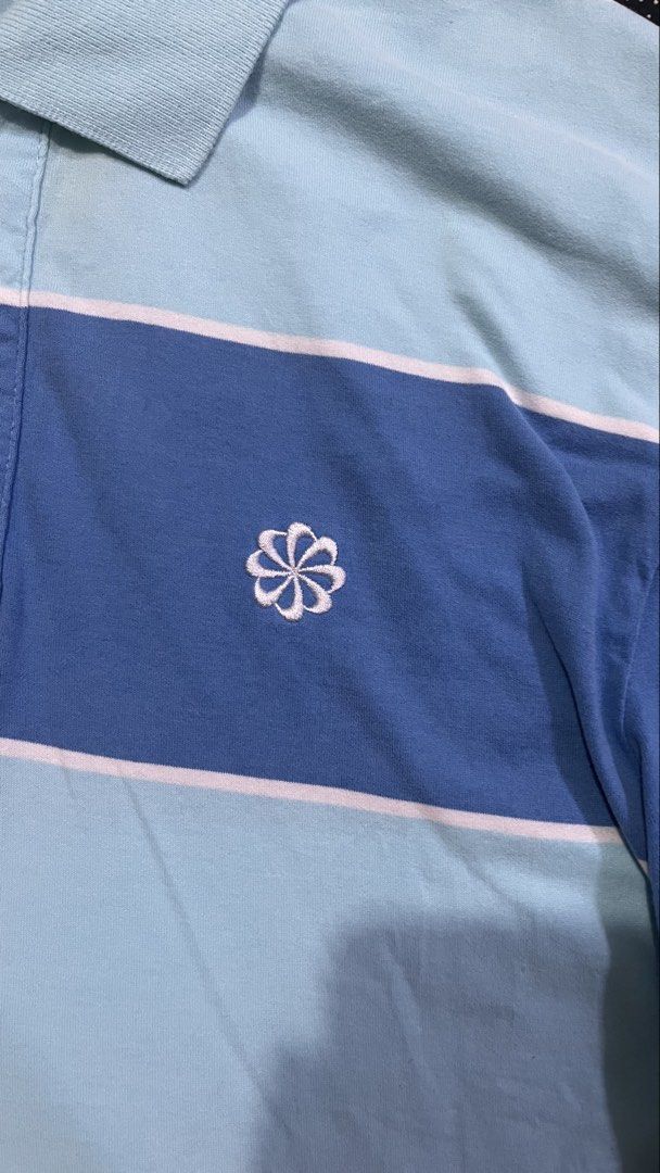 Nike striped polo shirt (Category: Tshirts & Polo Shirts ) located in Porac. Submitted by macky.ron (Listing ID 1465750836, Image 2). Description: Length:27 Width: 16 Condition: good Color rate: 9.5/10 Issue (s): none Complete Tags.