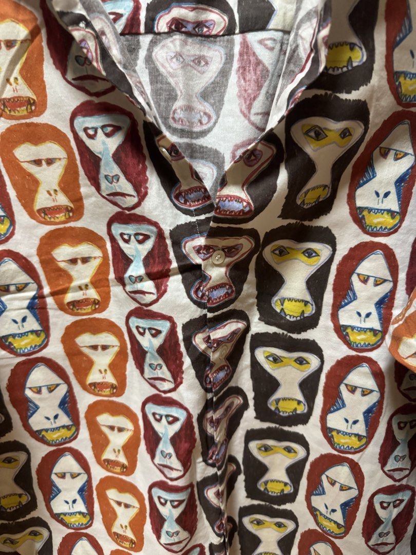 Niko And x Tsumori Chisato Button Down (Category: Tshirts & Polo Shirts ) located in Manila. Submitted by quintessesommerset (Listing ID 1465665596, Image 2). Description: - Brand/Collab: Tsumori Chisato x niko and... - Design: Fun monkey face all-over print - Size: 4 (marked on collar) 24x28 - Features: Lightweight fabric, button-front closure, standard collar - Style: Great statement piece for casual wear.
