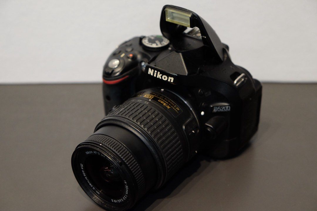 Nikon d5200 with 18-55mm lens (Category: Cameras) located in Manila. Submitted by gadgetcentral (Listing ID 1465758989, Image 1). Description: For sale‼️ Nikon D5200 with 18-55mm / 24.1MP 📸 Php13,000 💸 Perfect for📸 ➡️Photobooth ➡️Photojournalism Students ➡️Beginners ➡️School Photography ➡️Events & Documentation Condition:🔥 ✅keypad working ✅Autofocus working ✅flash working ✅Quality shots ✅No fungus ✅No vignette ✅💯% Good condition Inclusions: 