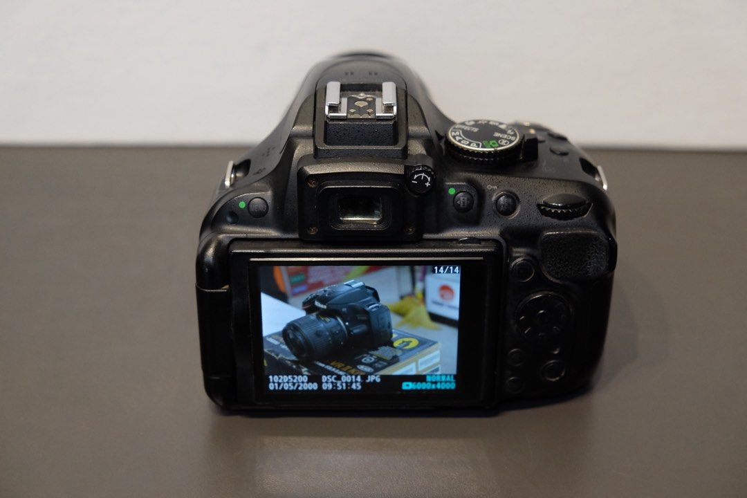 Nikon d5200 with 18-55mm lens (Category: Cameras) located in Manila. Submitted by gadgetcentral (Listing ID 1465758989, Image 2). Description: For sale‼️ Nikon D5200 with 18-55mm / 24.1MP 📸 Php13,000 💸 Perfect for📸 ➡️Photobooth ➡️Photojournalism Students ➡️Beginners ➡️School Photography ➡️Events & Documentation Condition:🔥 ✅keypad working ✅Autofocus working ✅flash working ✅Quality shots ✅No fungus ✅No vignette ✅💯% Good condition Inclusions: 