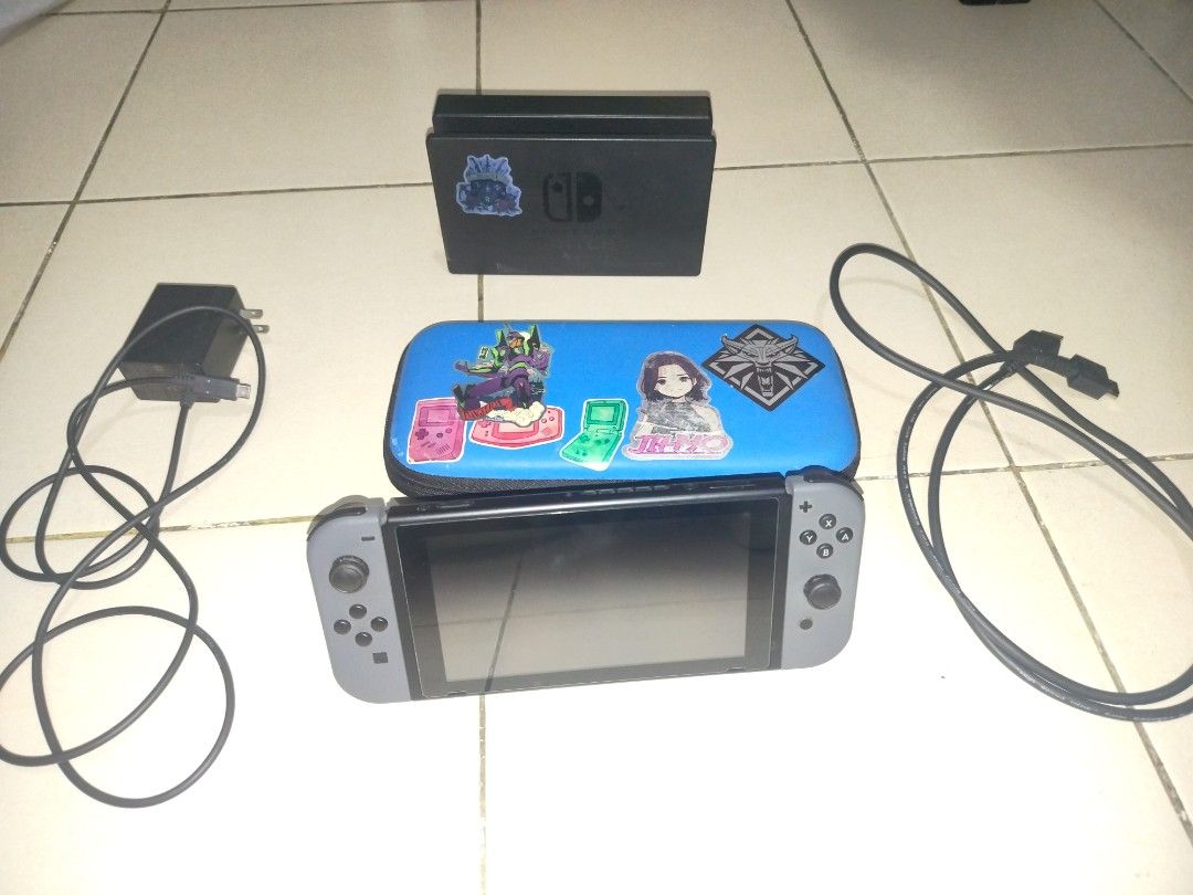 Nintendo Switch 1 V2 (Category: Other Gadgets) located in San Juan City. Submitted by aquarayus (Listing ID 1465590425, Image 2). Description: Nintendo Switch 1 V2 FULL PACKAGE Includes: Switch Dock HDMI Cable Type C Charger Switch Case Game (Monster Hunter Rise) Internal 32gb Memory with 120gb SD Card inside RFS: Di na nagagamit dahil sa work Preferred: Meetup around Ortigas or Greenhills.