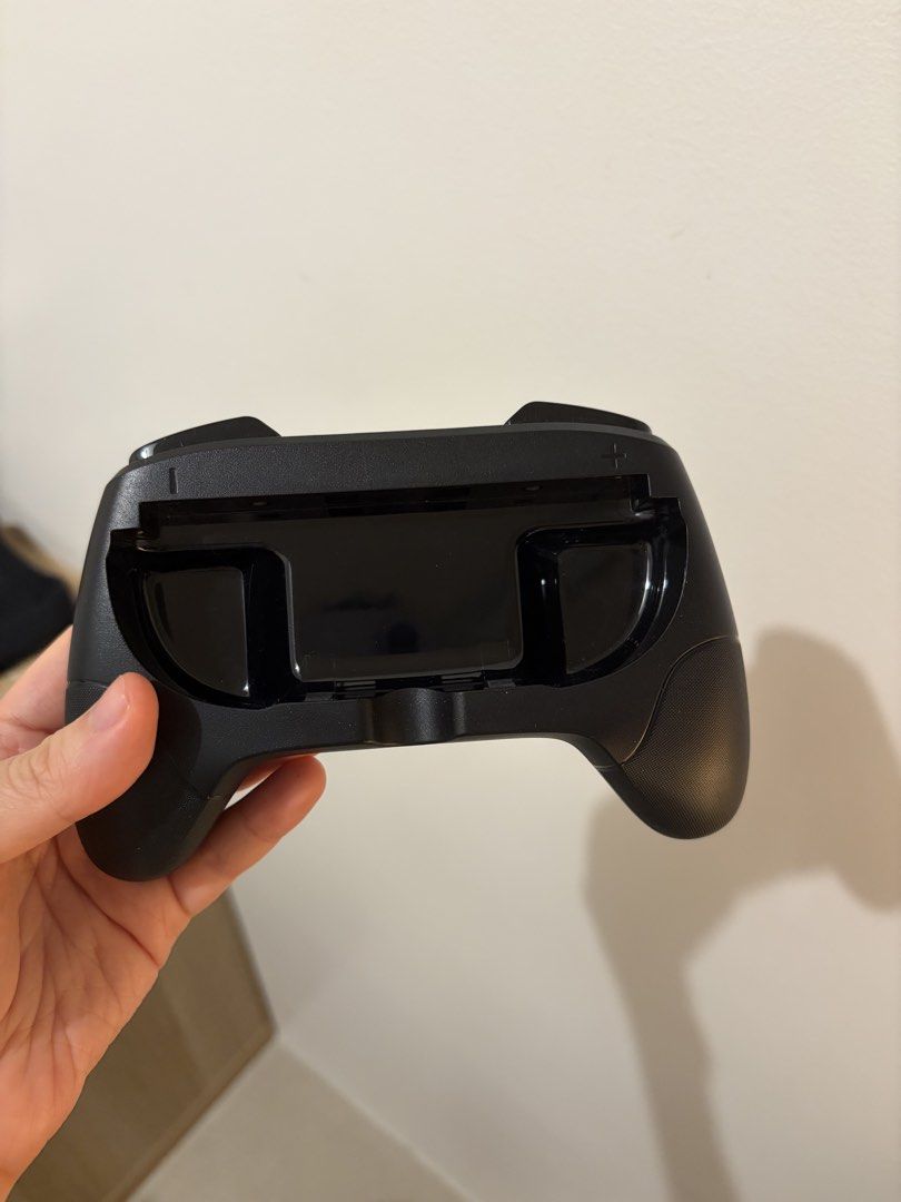 Nintendo Switch 2 Joy-con Grip (Category: Controllers) located in Mandaluyong City. Submitted by jgdeclutter1 (Listing ID 1465679667, Image 2). Description: Bought additional controllers, so I no longer need the extra grip. Price: ₱200 for both • Lightly used • No issues • No scratches • In good condition 📍 Meet-up: SM Megamall or Ayala 30th 📦 Can also arrange shipping if preferred. .