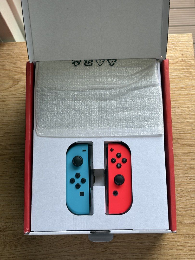 Nintendo Switch OLED Model Console Neon Red Blue (Category: Nintendo) located in Cagayan de Oro. Submitted by vanmalifier (Listing ID 1465607220, Image 2). Description: - Item: Nintendo Switch OLED Model Console (Neon Blue & Neon Red Joy-Cons) - Condition: Like new, only used twice, stored properly in box - Inclusions: Complete with original dock, cables, and packaging - Meetup/Shipping available across the Philippines.