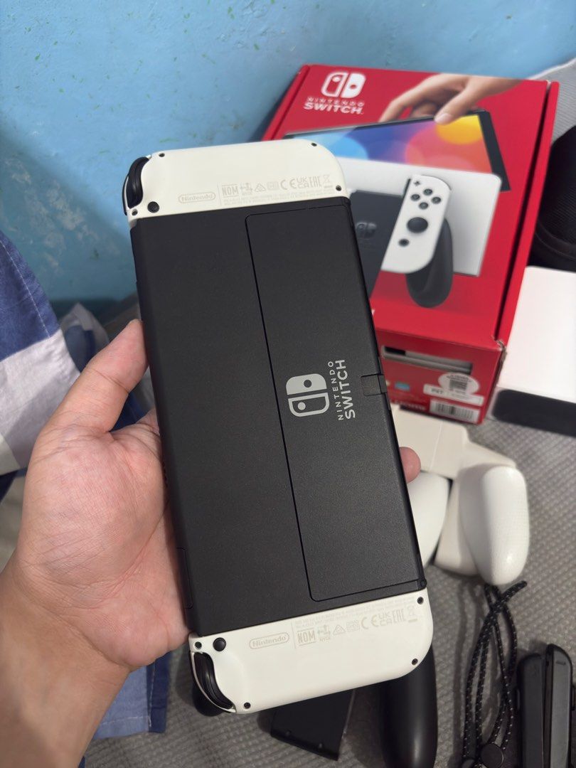 Nintendo Switch OLED with 125 Digital Games (Category: Nintendo) located in Cavite. Submitted by xsavier88 (Listing ID 1465626786, Image 3). Description: 🌟For sale for sale! Nintendo Switch OLED with 125 Digital Games Open for trade sa Nintendo Switch V1/V2/LITE or PS4 add ka cash 11,000 PHP 11,000 PHP 11,000 PHP 🌟INCLUSIONS: Complete with box Carrying pouch (Skull&Co) Neo Grip Set 125 Digital Games (Check the attached images for the list of ga